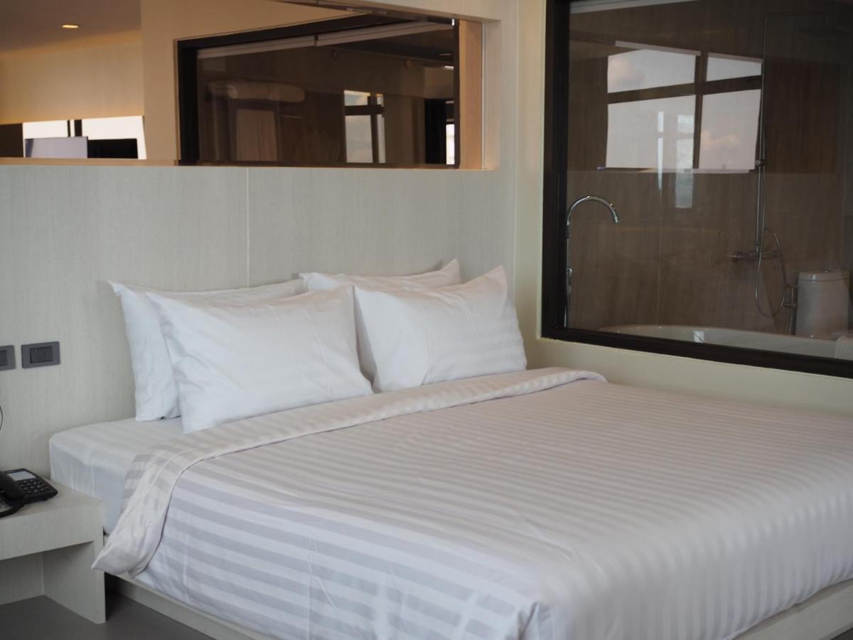 Hermann Hotel Pattaya - Sha Extra Plus מראה חיצוני תמונה A bed
